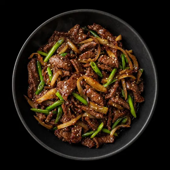 Bœuf sauté aux oignons